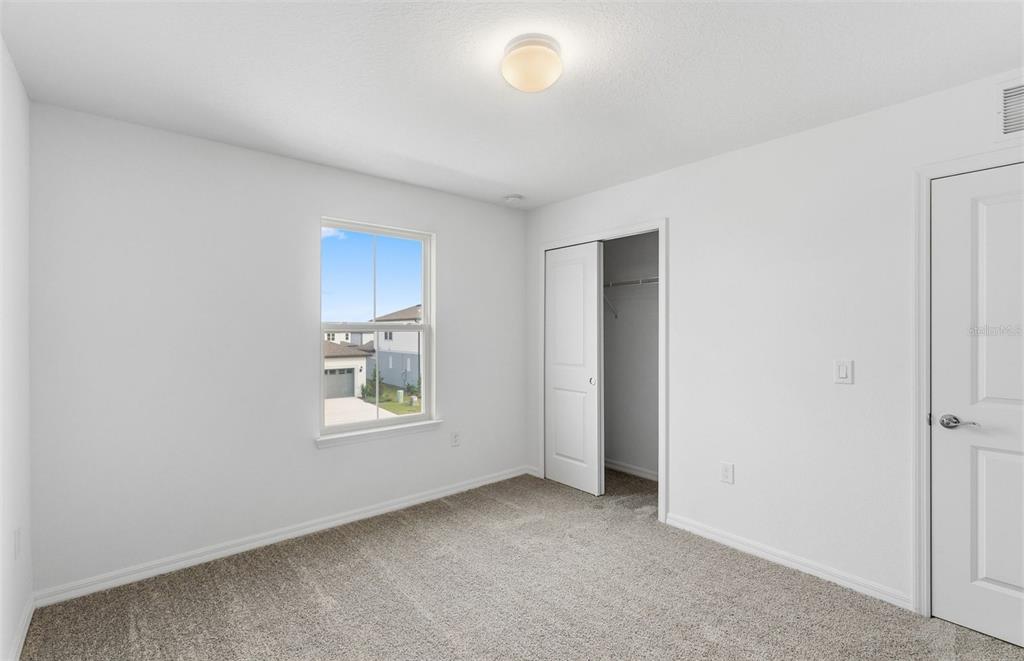 1277 Lakeridge Way Lake Lake Alfred, FL 33850 - Photo 15 of 29 a view of an empty room with a window