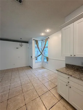 a front view of a house with a space