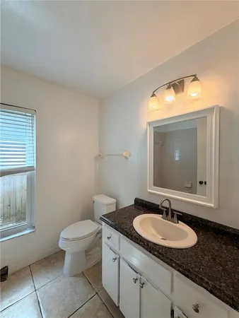 a view of a room with a floor to ceiling window