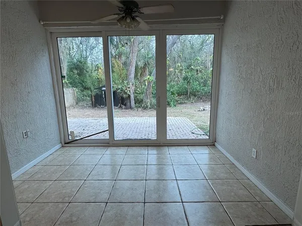 a view of a car parked in front of a house