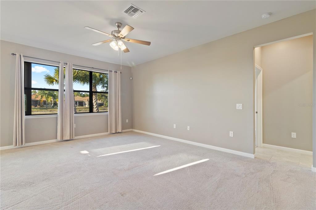 1530 Hyssop Loop North Port, FL 34289 - Photo 18 of 53 a view of an empty room with a window