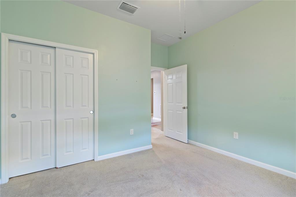 1530 Hyssop Loop North Port, FL 34289 - Photo 21 of 53 an empty room with closet area