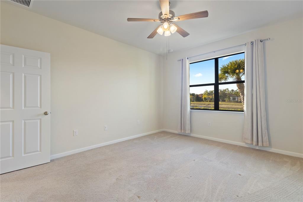 1530 Hyssop Loop North Port, FL 34289 - Photo 28 of 53 a view of an empty room with a window