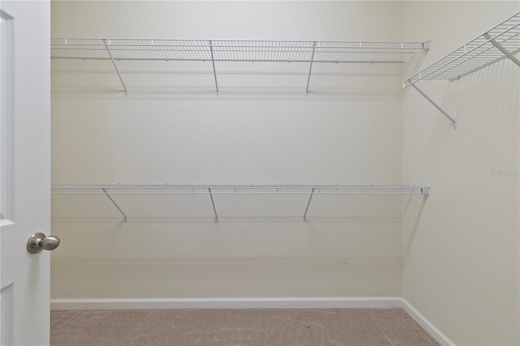 1530 Hyssop Loop North Port, FL 34289 - Photo 31 of 53 a view of a room with racks on the wall