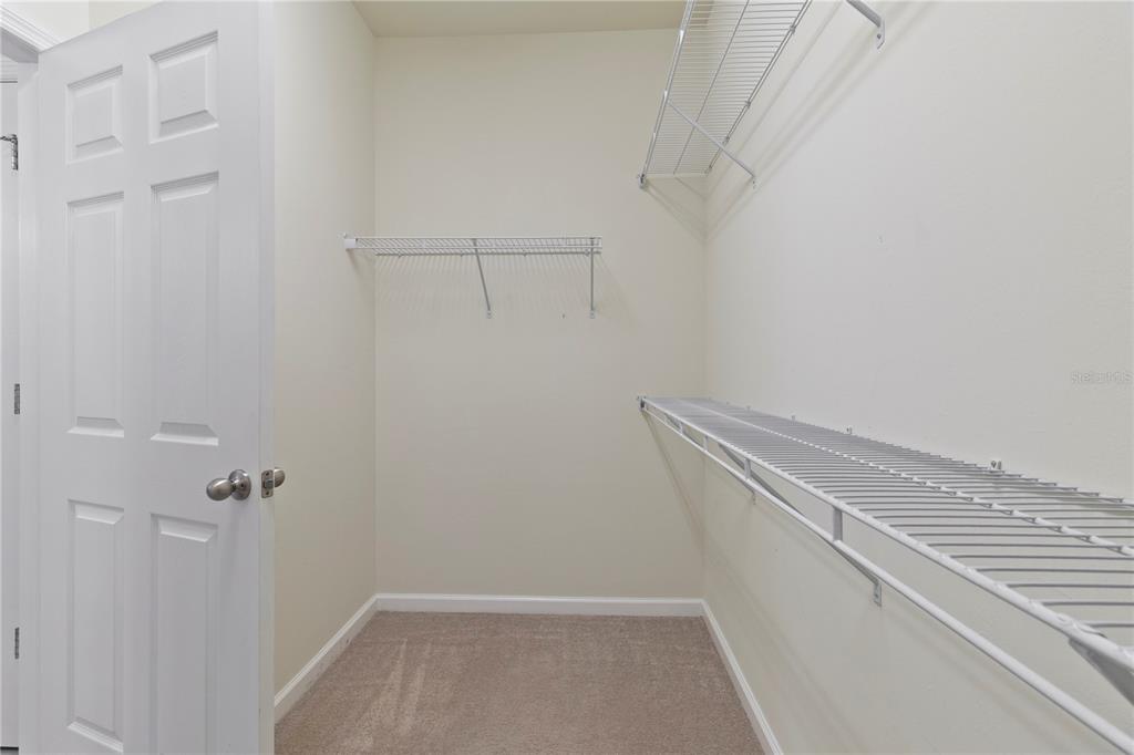 1530 Hyssop Loop North Port, FL 34289 - Photo 32 of 53 a view of a room with racks on the wall