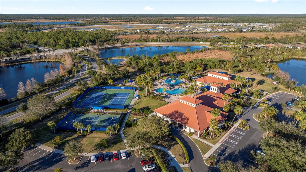 1530 Hyssop Loop North Port, FL 34289 - Photo 48 of 53 an aerial view of residential houses with outdoor space