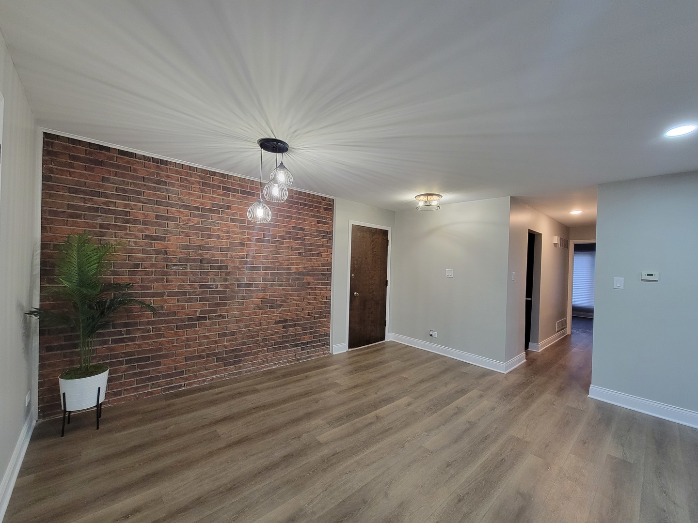 1100 Holbrook Road, Unit H Homewood, IL 60430 - Photo 12 of 14 a view of hallway with wooden floor