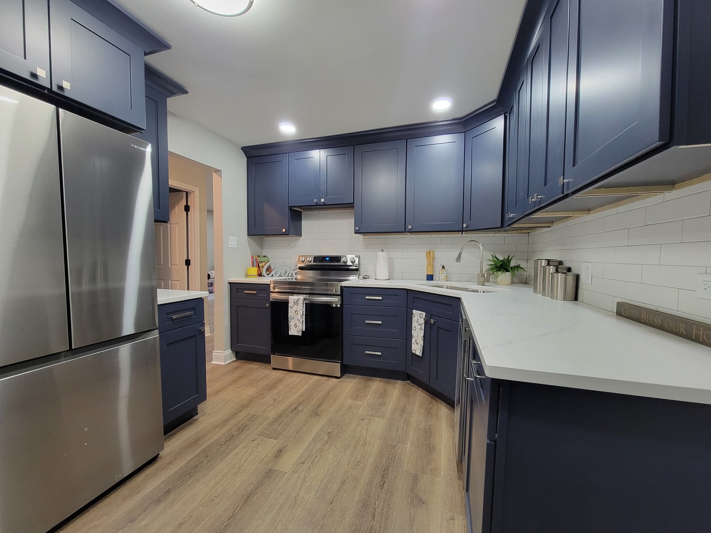 1100 Holbrook Road, Unit H Homewood, IL 60430 - Photo 3 of 14 a kitchen with a refrigerator sink and wooden cabinets