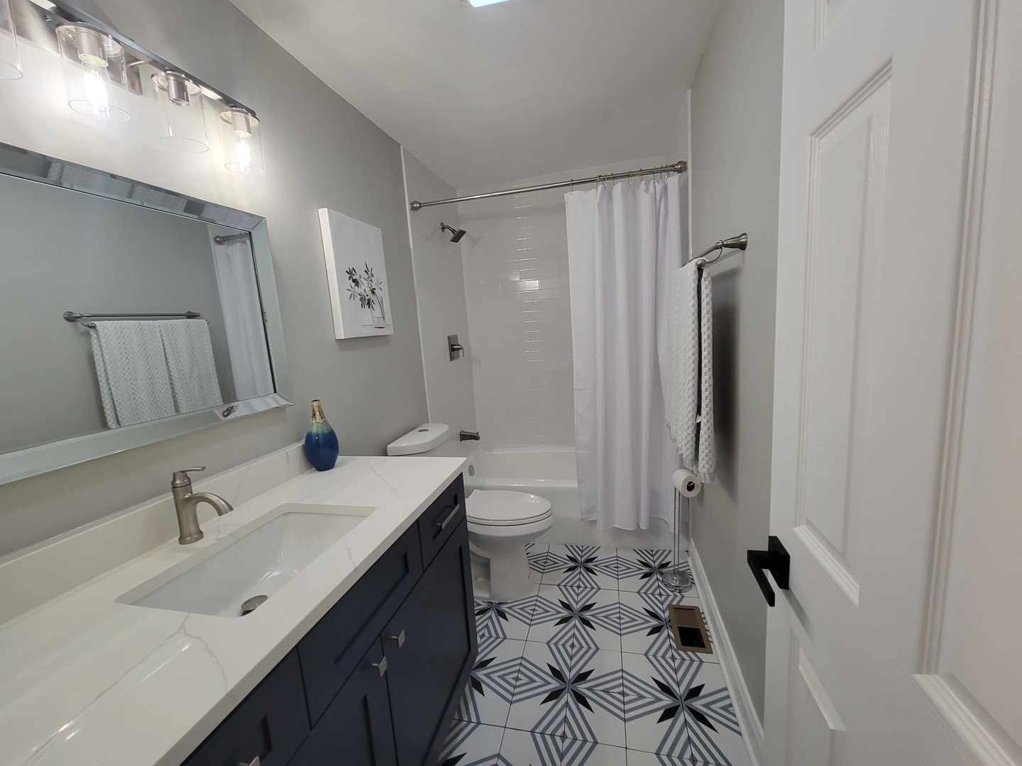 1100 Holbrook Road, Unit H Homewood, IL 60430 - Photo 6 of 14 a bathroom with a sink toilet double vanity and shower
