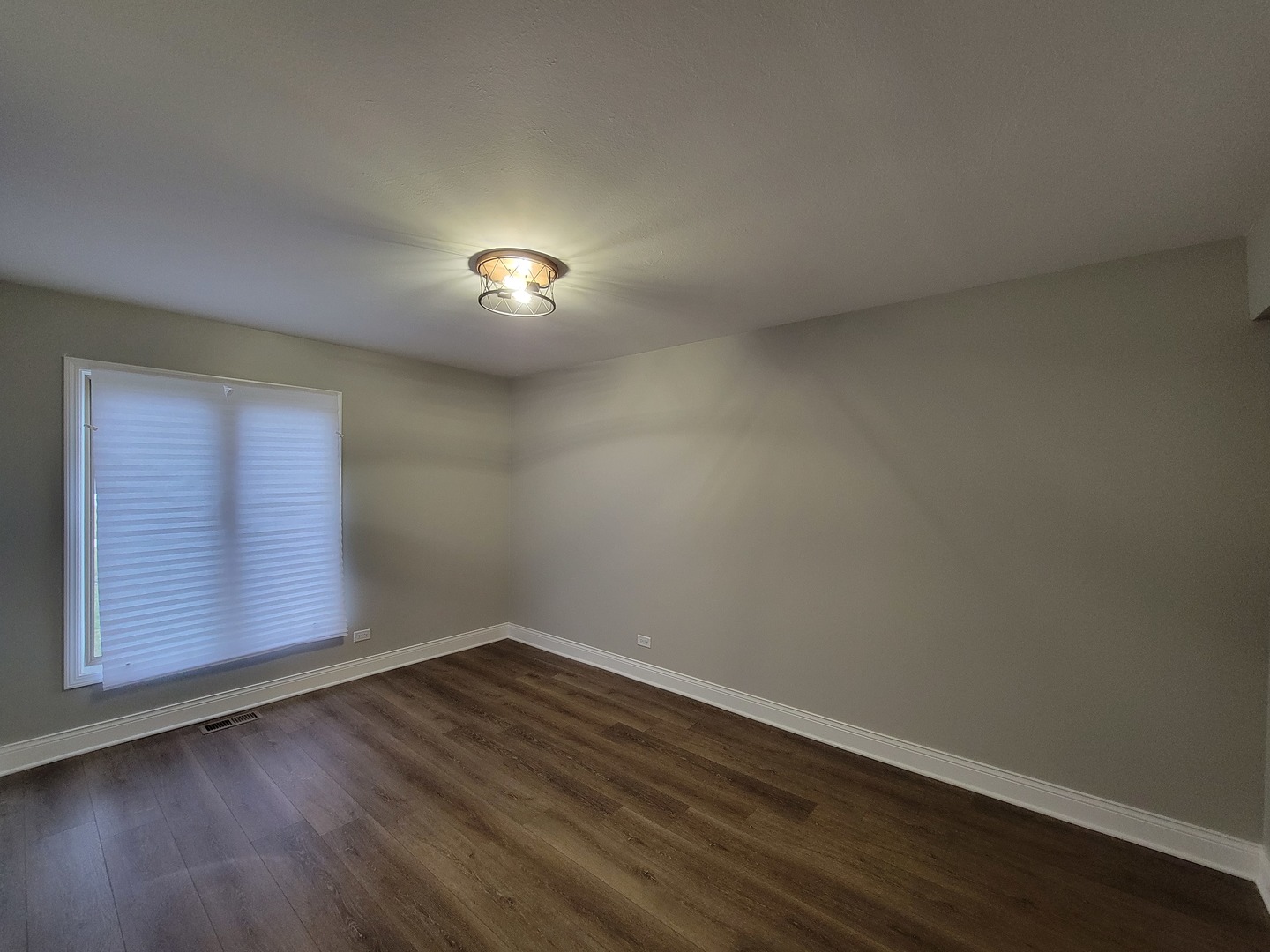 1100 Holbrook Road, Unit H Homewood, IL 60430 - Photo 8 of 14 a view of an empty room with wooden floor and a window