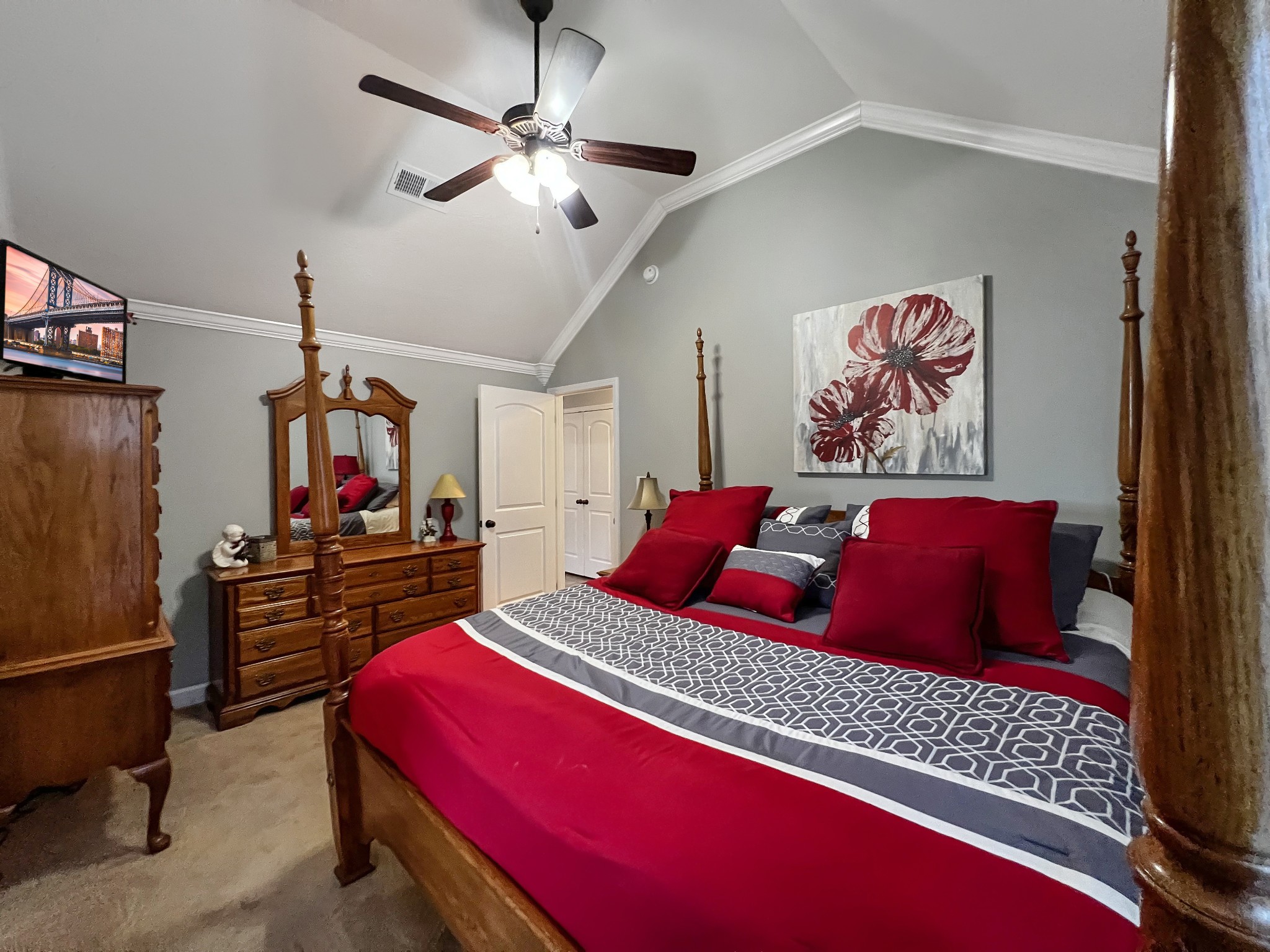 48 Nehemiah Drive Jackson, TN 38305 - Photo 12 of 21 a bedroom with a large bed and a chandelier