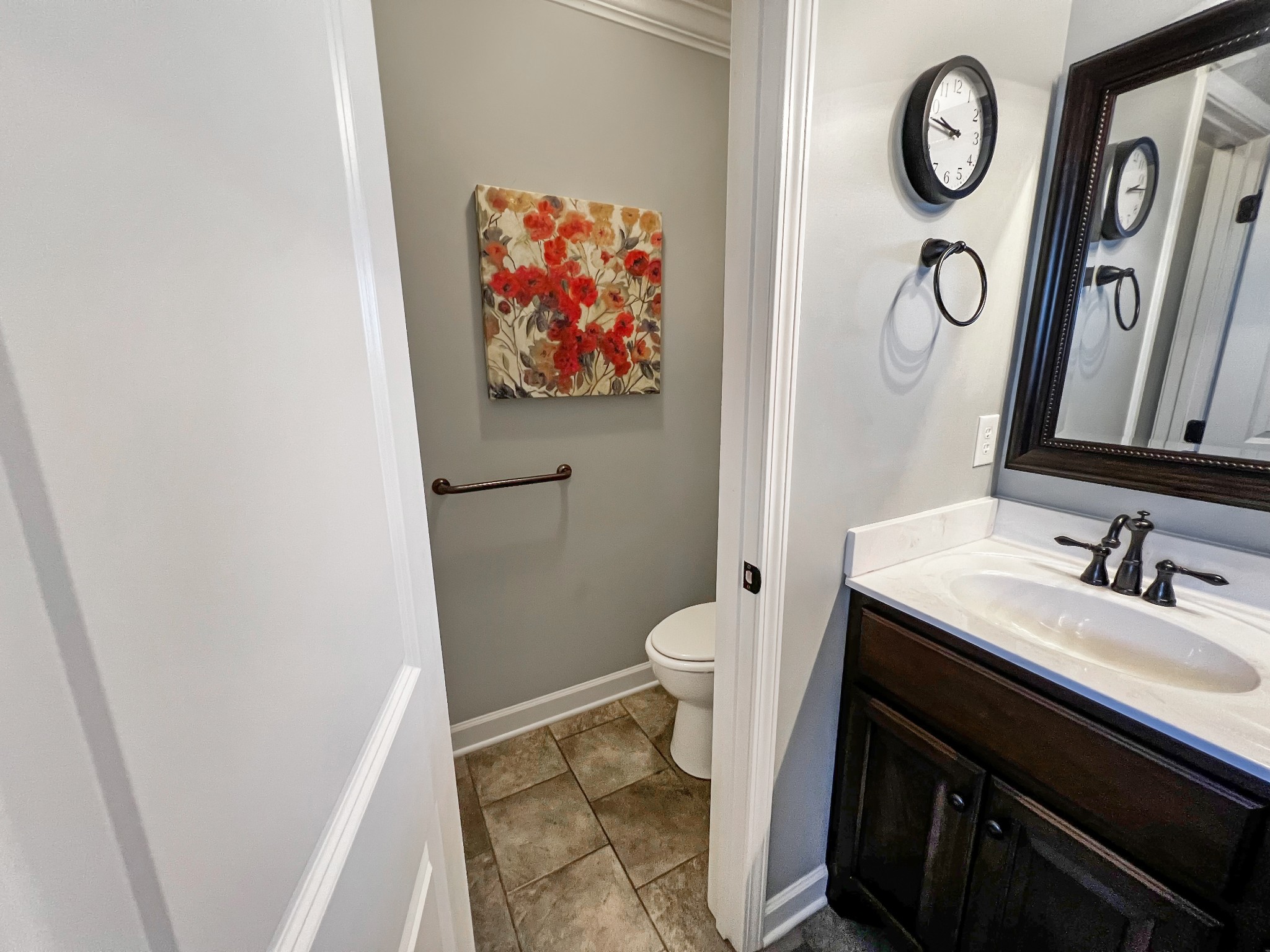 48 Nehemiah Drive Jackson, TN 38305 - Photo 16 of 21 a bathroom with a toilet a sink and a mirror