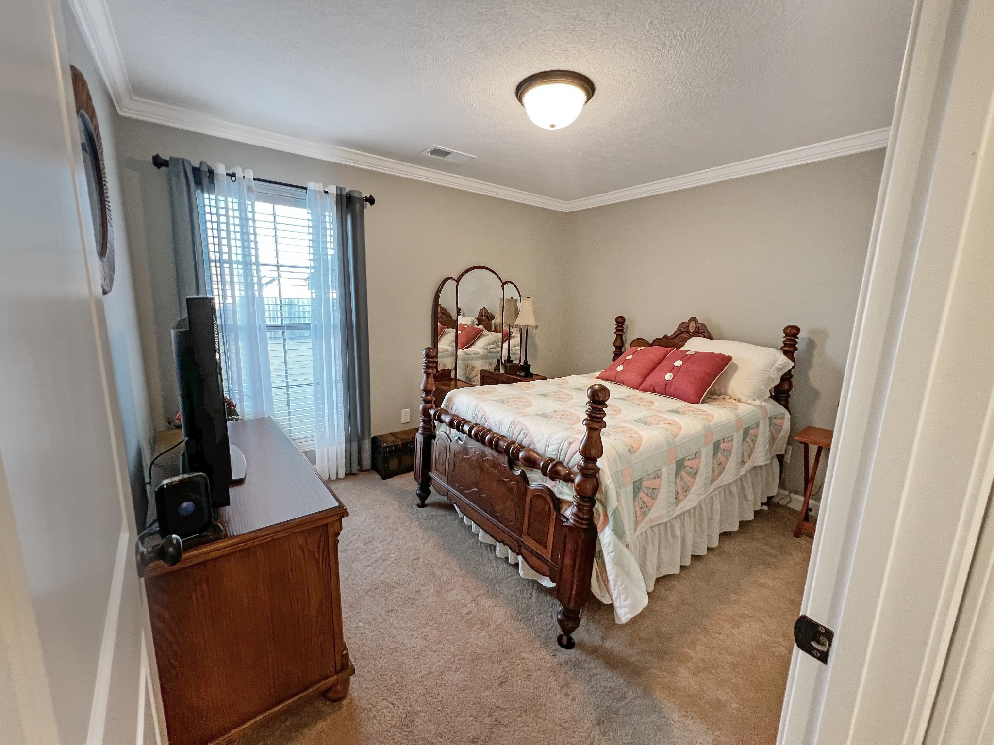 48 Nehemiah Drive Jackson, TN 38305 - Photo 18 of 21 a bed room with a bed and a couch