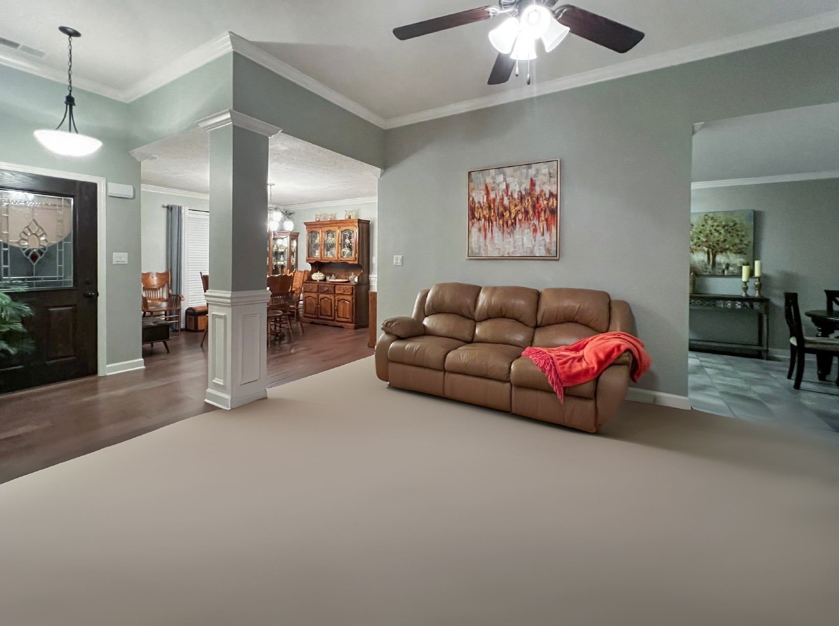 48 Nehemiah Drive Jackson, TN 38305 - Photo 3 of 21 a living room with furniture and a chandelier