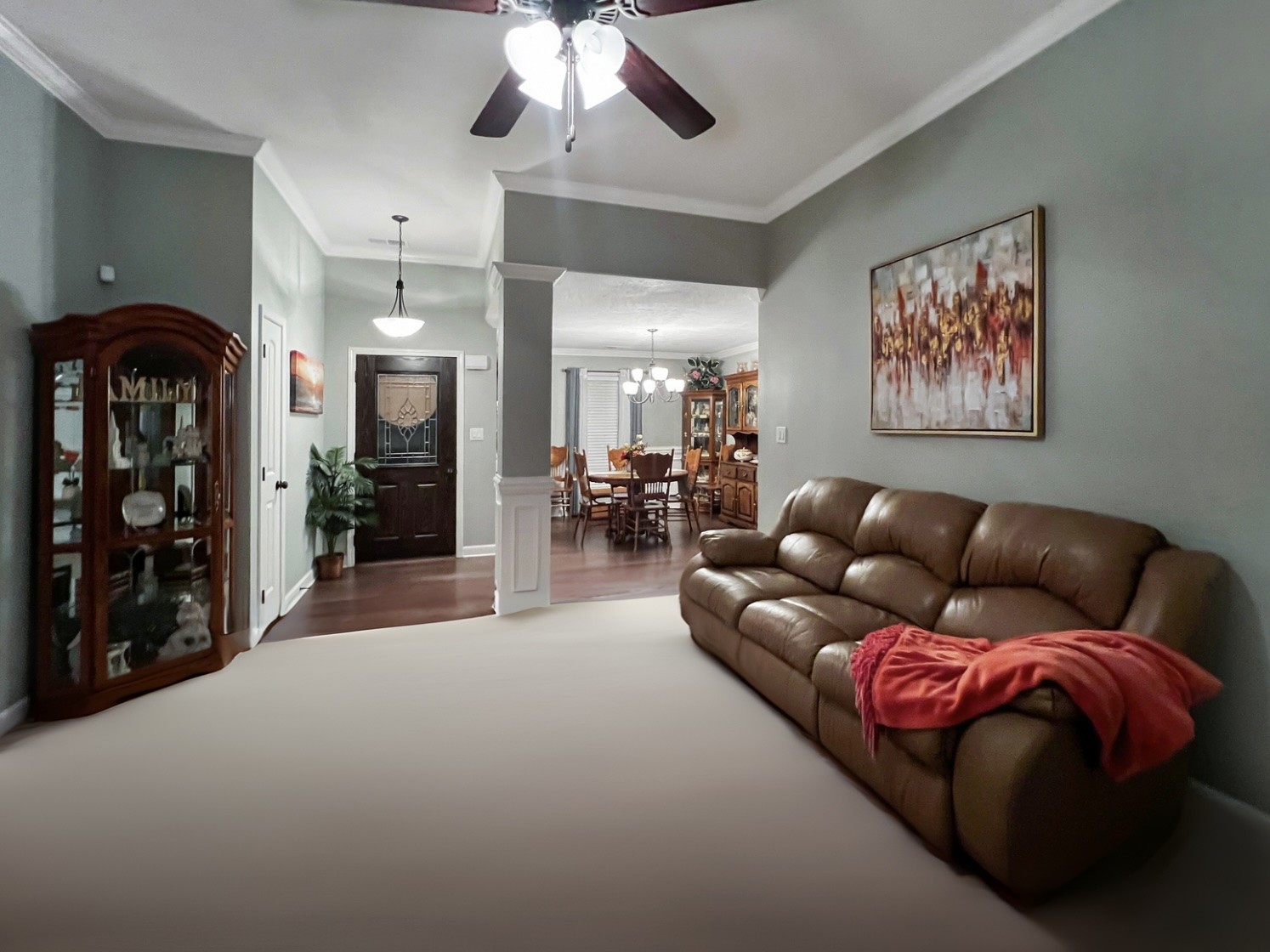 48 Nehemiah Drive Jackson, TN 38305 - Photo 4 of 21 a living room with furniture and a chandelier