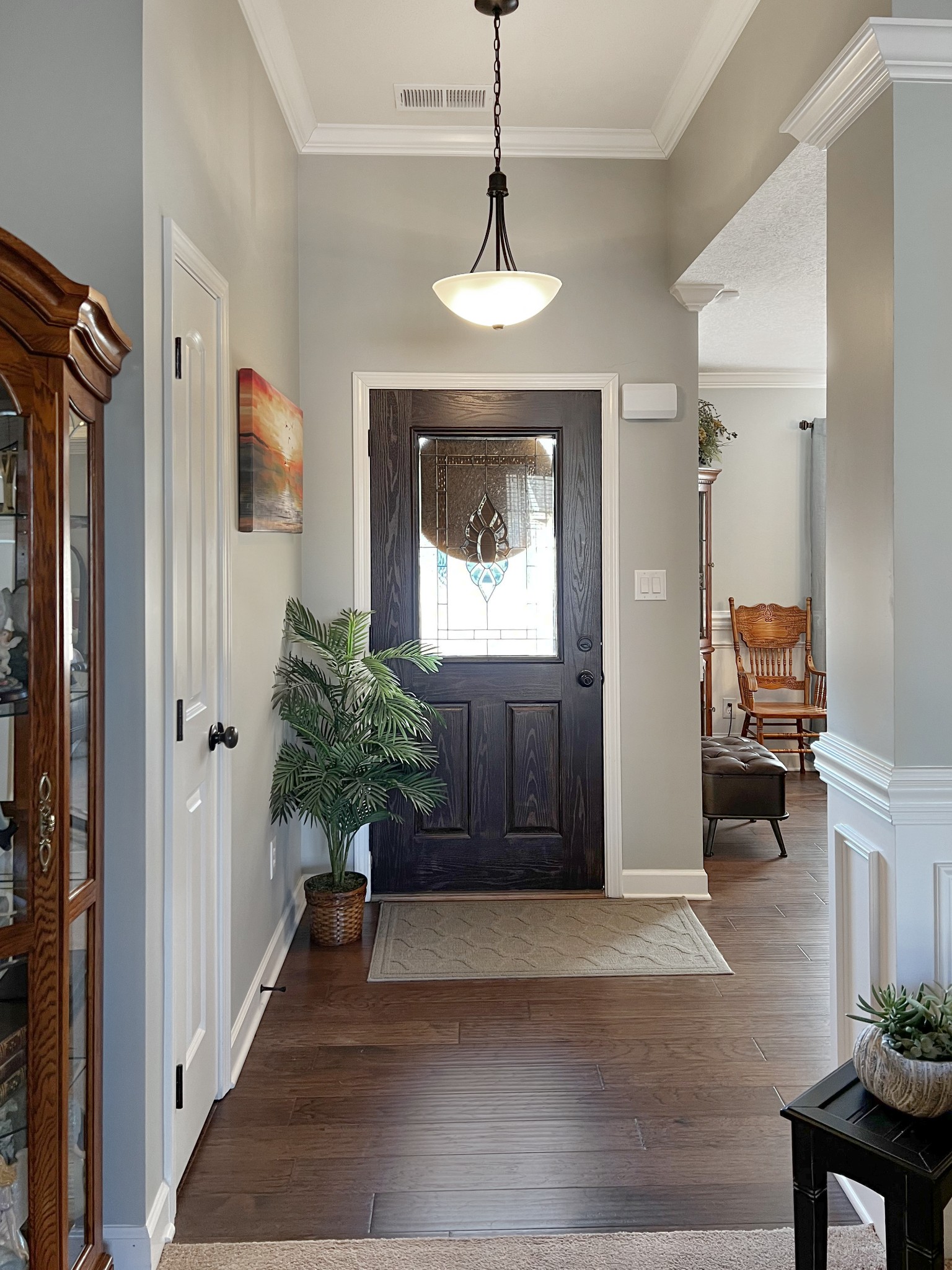 48 Nehemiah Drive Jackson, TN 38305 - Photo 6 of 21 a living room with furniture and a chandelier