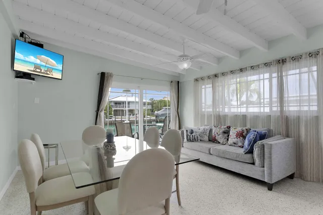a kitchen with stainless steel appliances white cabinets and sink