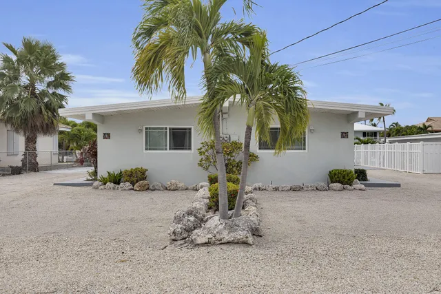 a front view of a house with patio