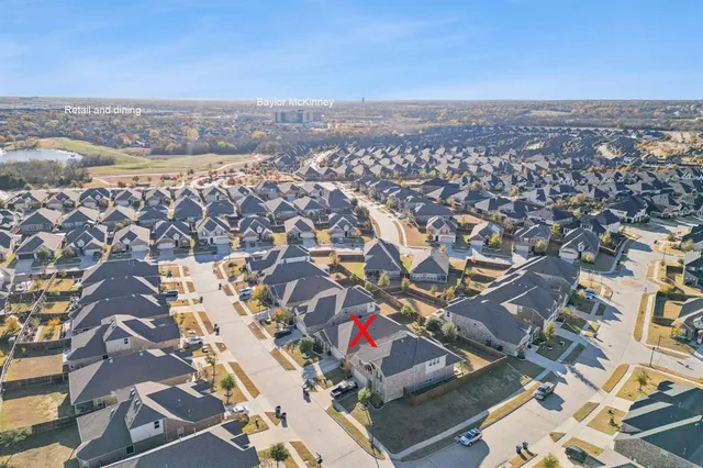 an aerial view of residential building and city view