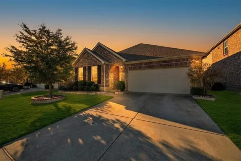 a front view of house with yard