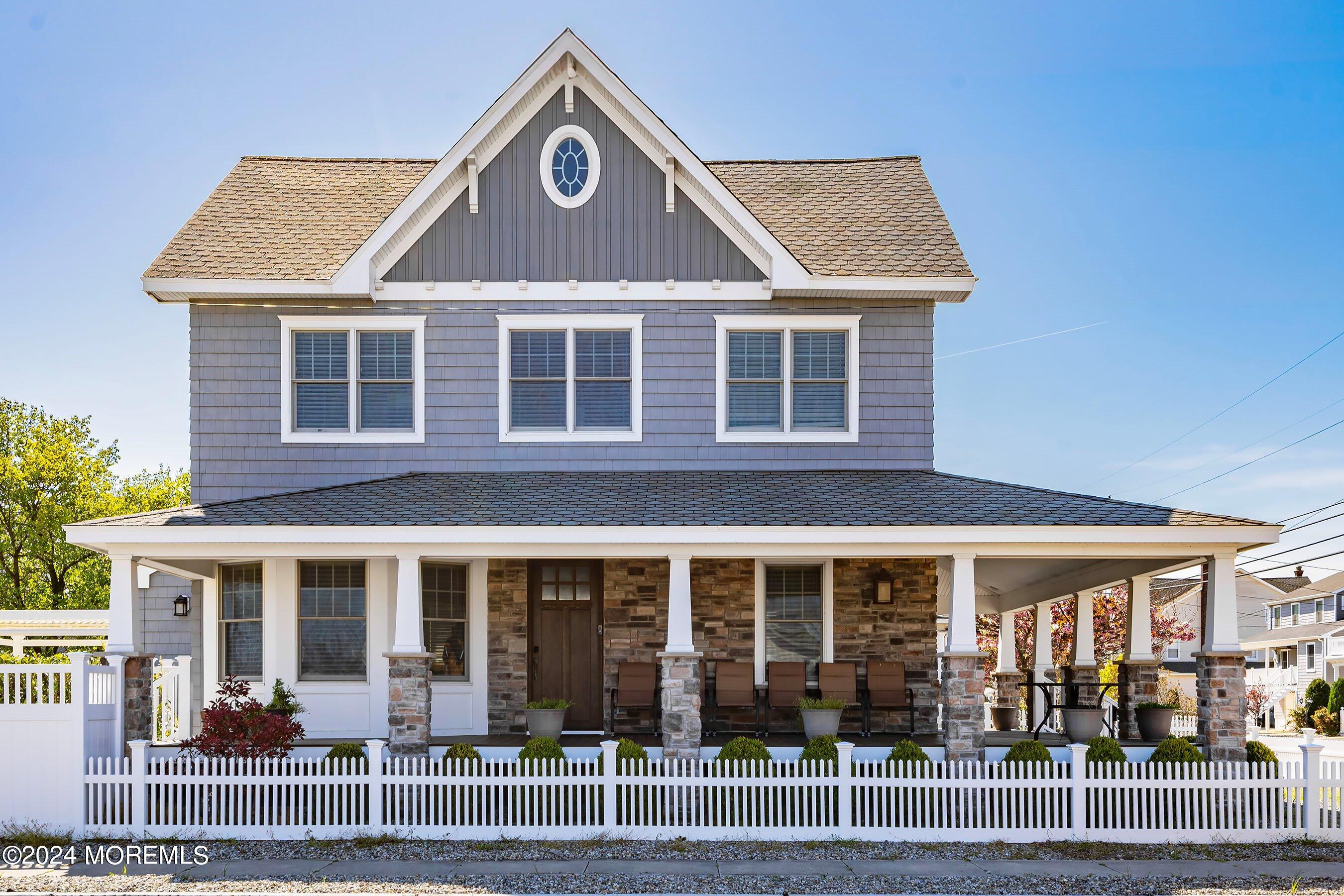 100 Forman Avenue Point Pleasant Beach, NJ 08742 - Photo 1 of 46 front view of a house with a porch