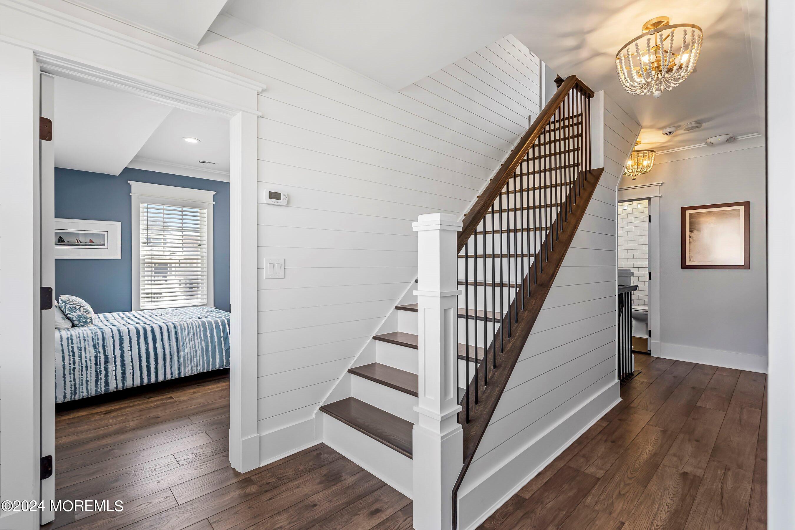 100 Forman Avenue Point Pleasant Beach, NJ 08742 - Photo 15 of 46 a view of a hallway with entryway wooden floor and stairs