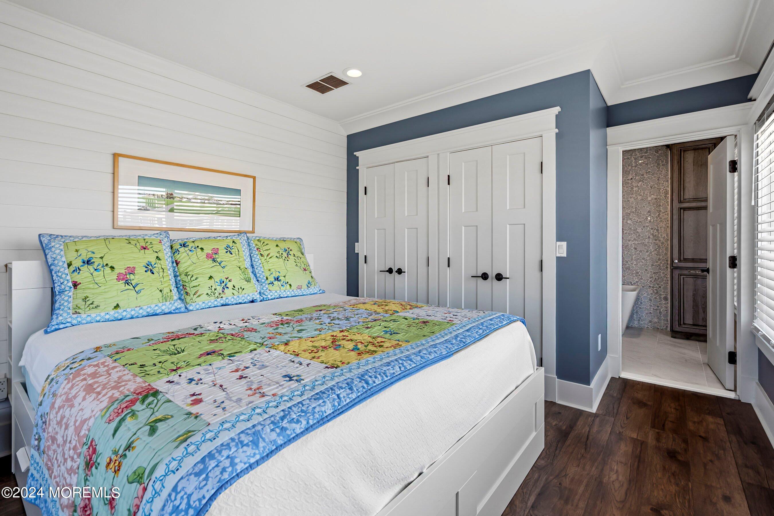 100 Forman Avenue Point Pleasant Beach, NJ 08742 - Photo 20 of 46 a bedroom with a bed and a walk in closet