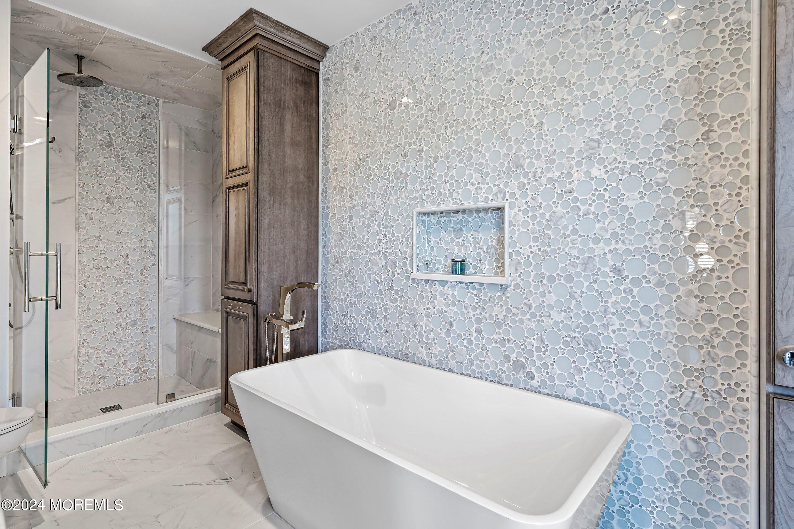 100 Forman Avenue Point Pleasant Beach, NJ 08742 - Photo 22 of 46 a bathroom with a bathtub and shower