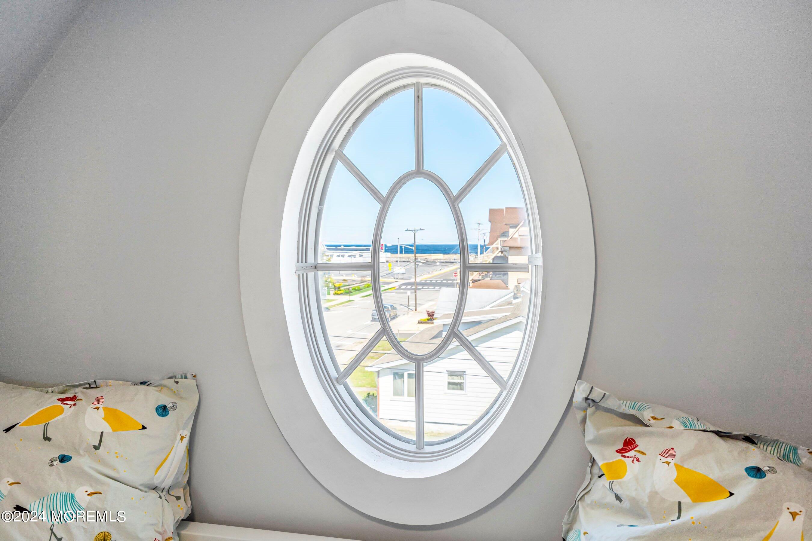 100 Forman Avenue Point Pleasant Beach, NJ 08742 - Photo 28 of 46 a view of a bedroom with a baby crib furniture and a window