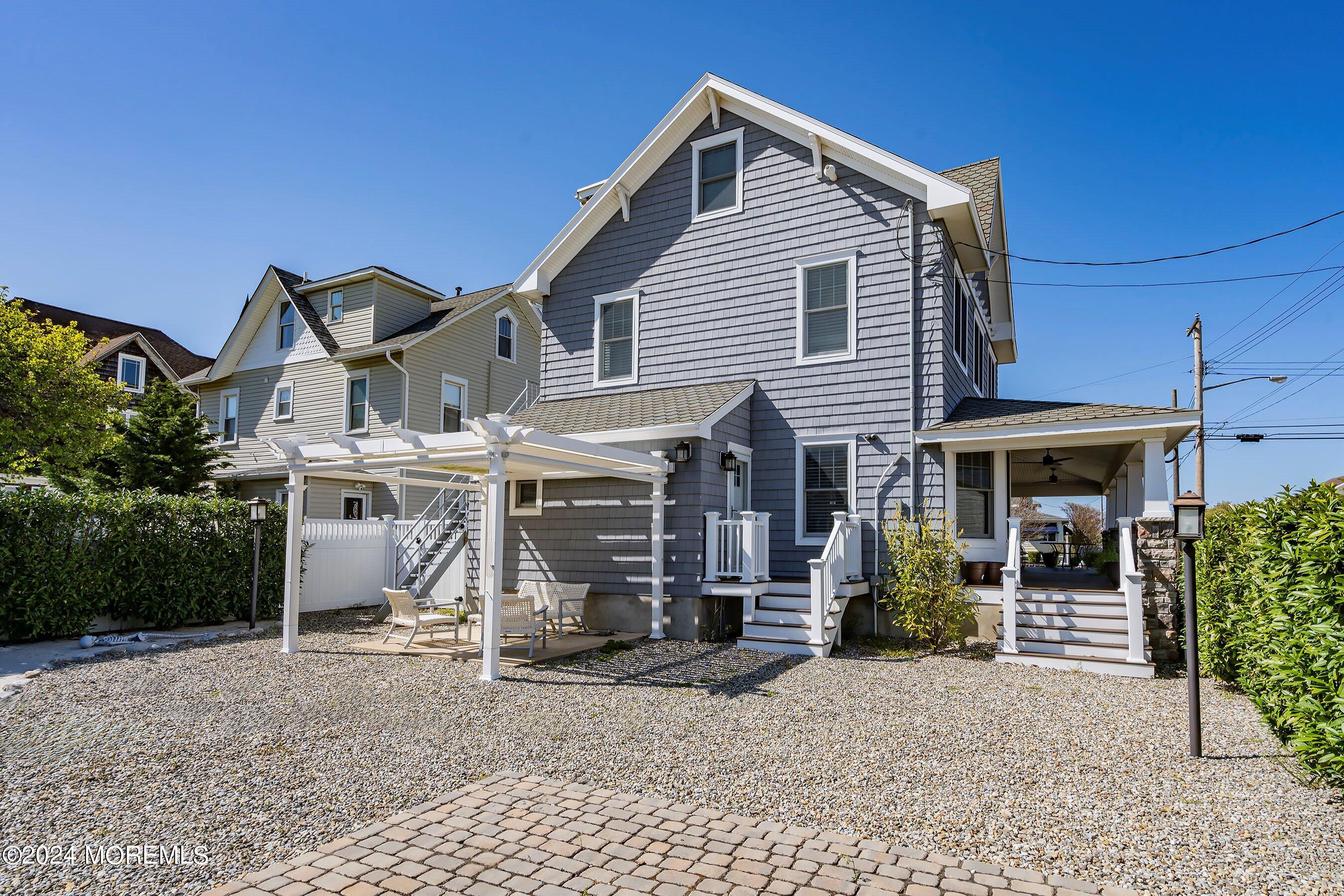 100 Forman Avenue Point Pleasant Beach, NJ 08742 - Photo 33 of 46 a front view of a house with a yard