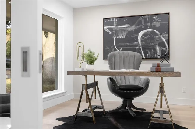 a view of entryway with a table and chairs