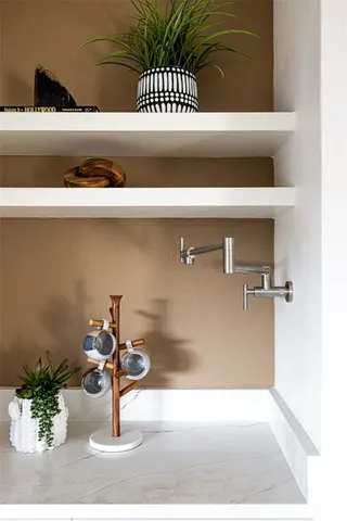 a view of a living room with a potted plant