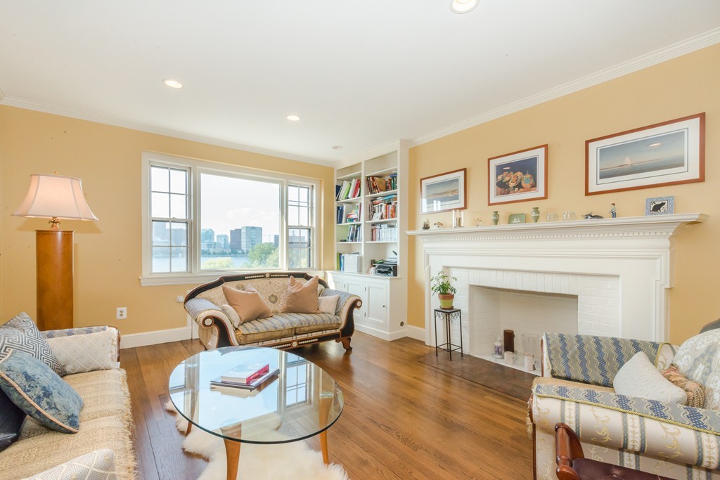 280 Beacon Street, Unit 65 Boston, MA 02116 - Photo 2 of 15 a living room with furniture and a fireplace