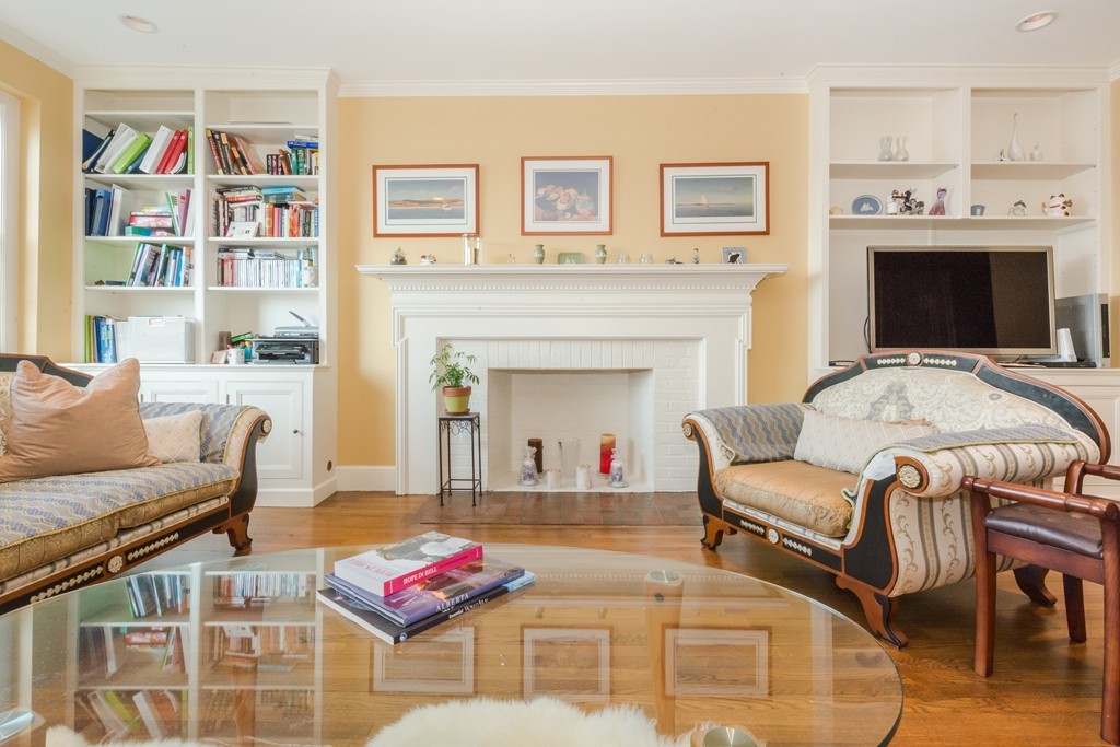 280 Beacon Street, Unit 65 Boston, MA 02116 - Photo 4 of 15 a living room with furniture fireplace and rug