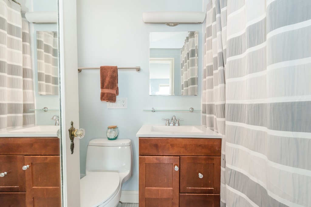 280 Beacon Street, Unit 65 Boston, MA 02116 - Photo 10 of 15 a bathroom with a sink toilet vanity and tub