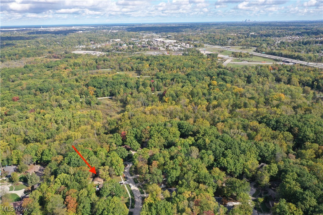 11650 River Moss Road Strongsville, OH 44136 - Photo 36 of 37 Aerial view of property and surrounding area featuring a heavily wooded area