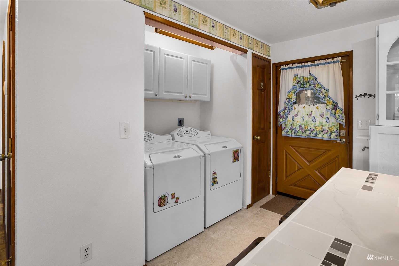 2141 Mason Benson Road East Grapeview, WA 98546 - Photo 12 of 40 a storage room with storage