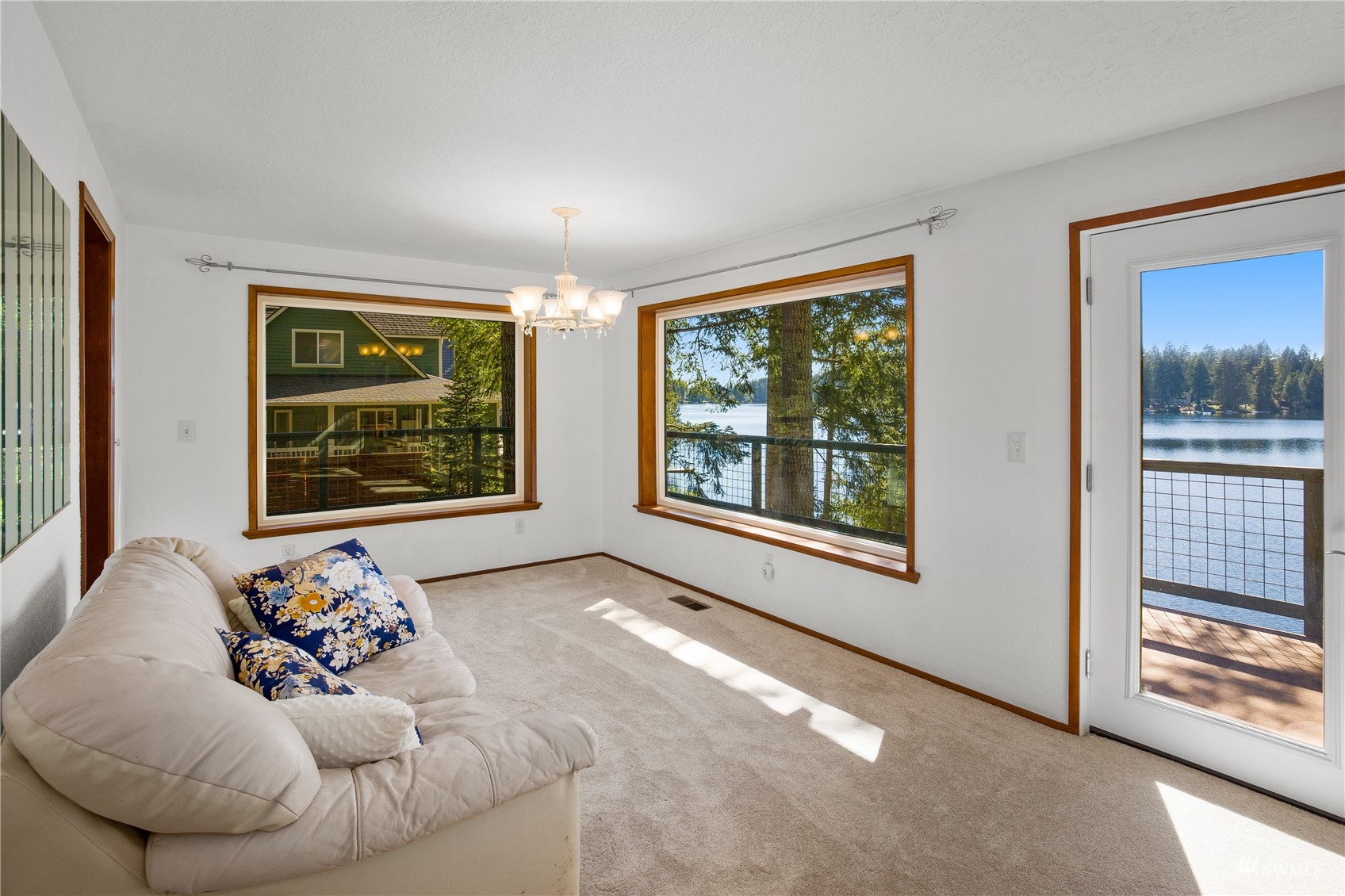 2141 Mason Benson Road East Grapeview, WA 98546 - Photo 18 of 40 a living room with furniture and a large window