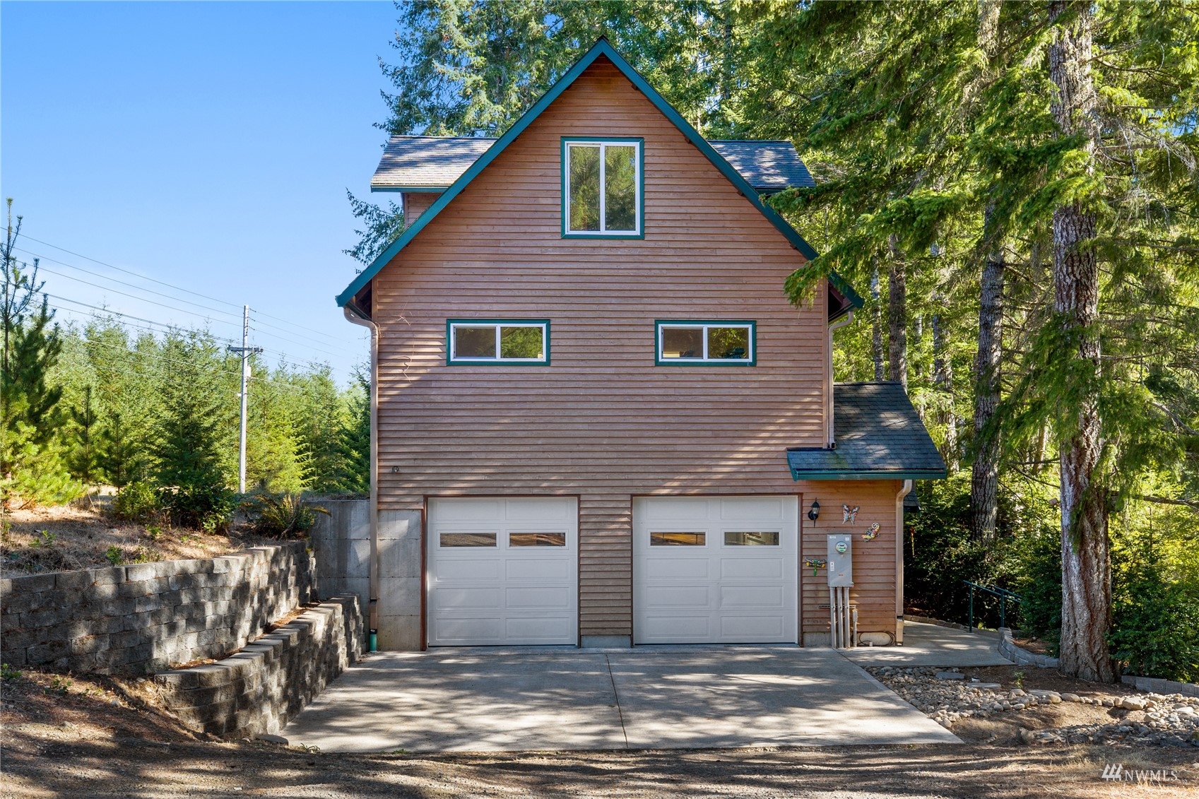 2141 Mason Benson Road East Grapeview, WA 98546 - Photo 30 of 40 a front view of a house with a yard