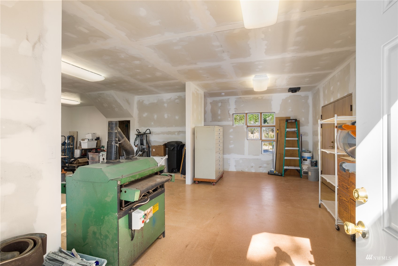 2141 Mason Benson Road East Grapeview, WA 98546 - Photo 33 of 40 a living room with furniture and a view of bedroom