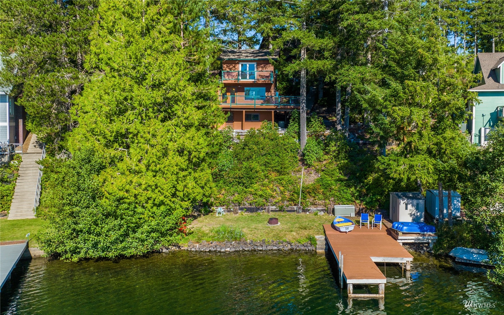 2141 Mason Benson Road East Grapeview, WA 98546 - Photo 38 of 40 a backyard of a house with yard and outdoor seating