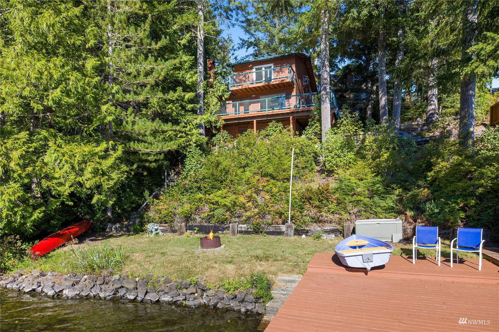 2141 Mason Benson Road East Grapeview, WA 98546 - Photo 6 of 40 a car parked in front of a brick house