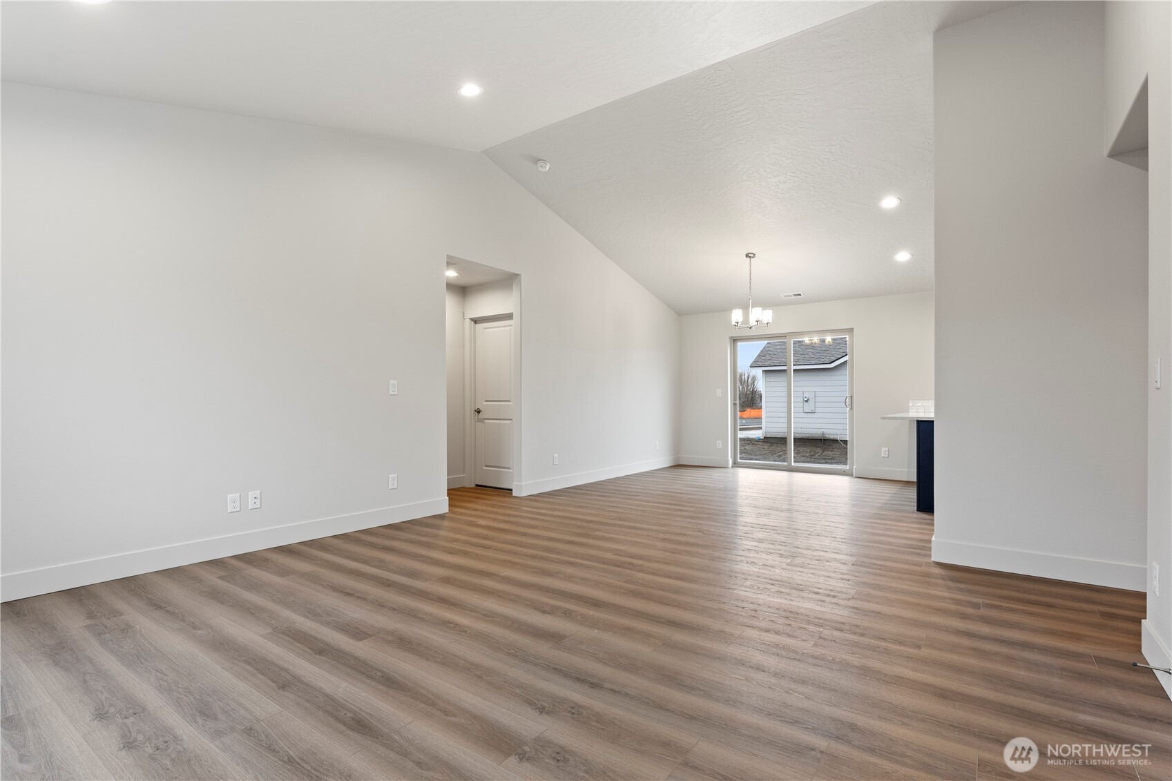 202 North Sandy Loop Moses Lake, WA 98837 - Photo 2 of 24 a view of empty room with wooden floor
