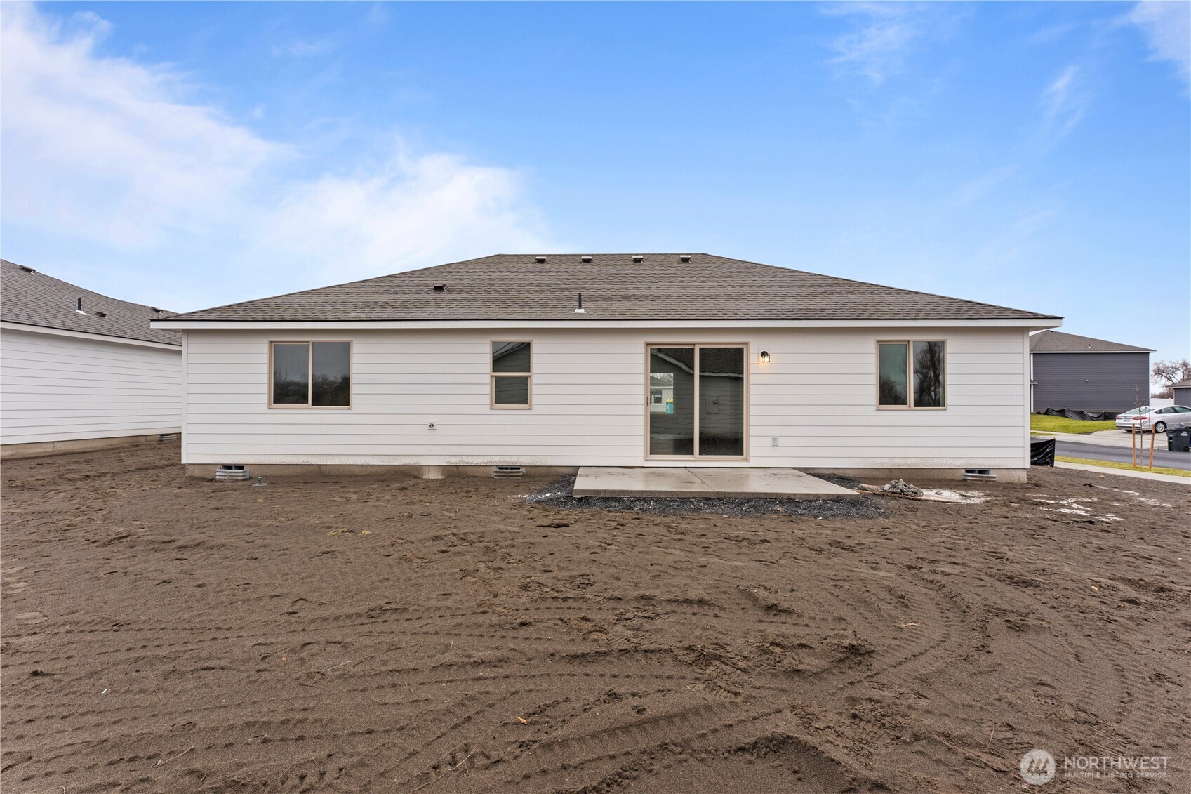 202 North Sandy Loop Moses Lake, WA 98837 - Photo 24 of 24 a front view of a house with a garden