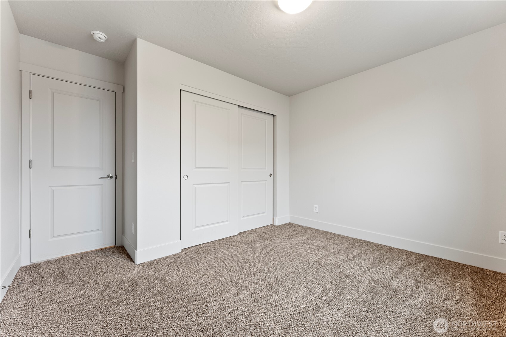 202 North Sandy Loop Moses Lake, WA 98837 - Photo 10 of 24 an empty room with closet area