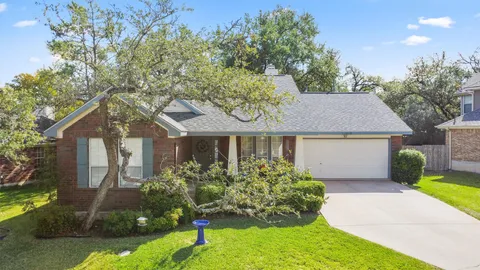front view of house with a yard