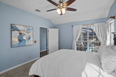 a view of a dining room and livingroom with furniture