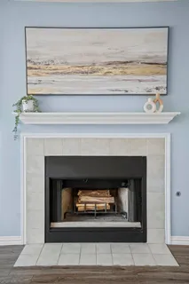 a living room with a fireplace