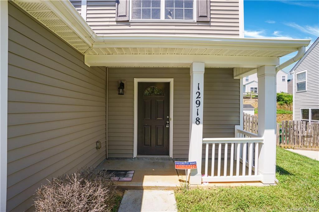 12918 Rothe House Road Charlotte, NC 28273 - Photo 2 of 25 a front view of a house