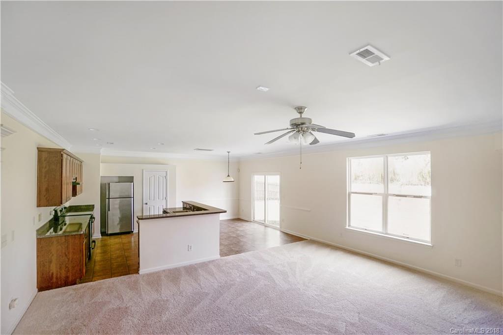 12918 Rothe House Road Charlotte, NC 28273 - Photo 16 of 25 a view of a kitchen with a sink and cabinet area